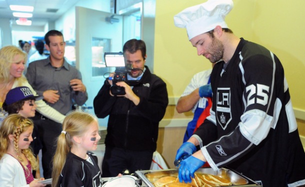 LA Kings left winger Dustin Penner serves up pacake breakfast to fans who gathered in Westchester for the "Pancakes for Penner" event. Photo by Brad Graverson 2-13-12
